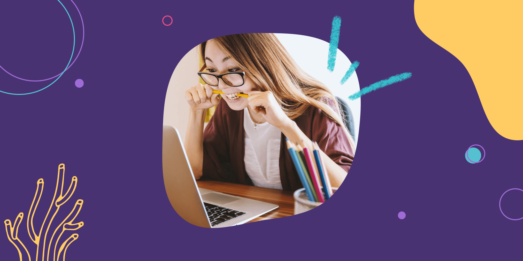 a woman stares into the computer screen with a pencil in her mouth looking inquisitive