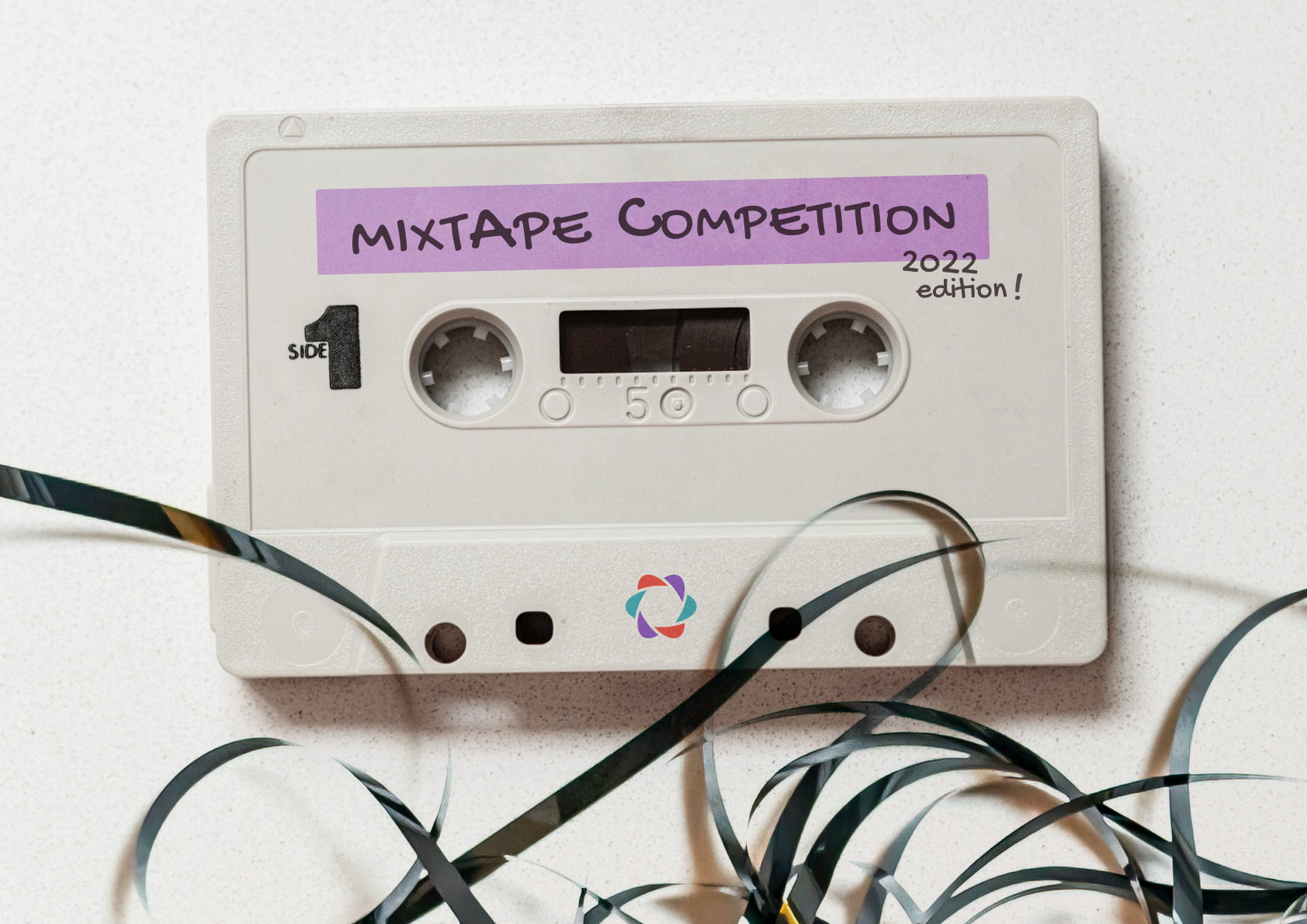 A cassette tape with the text 