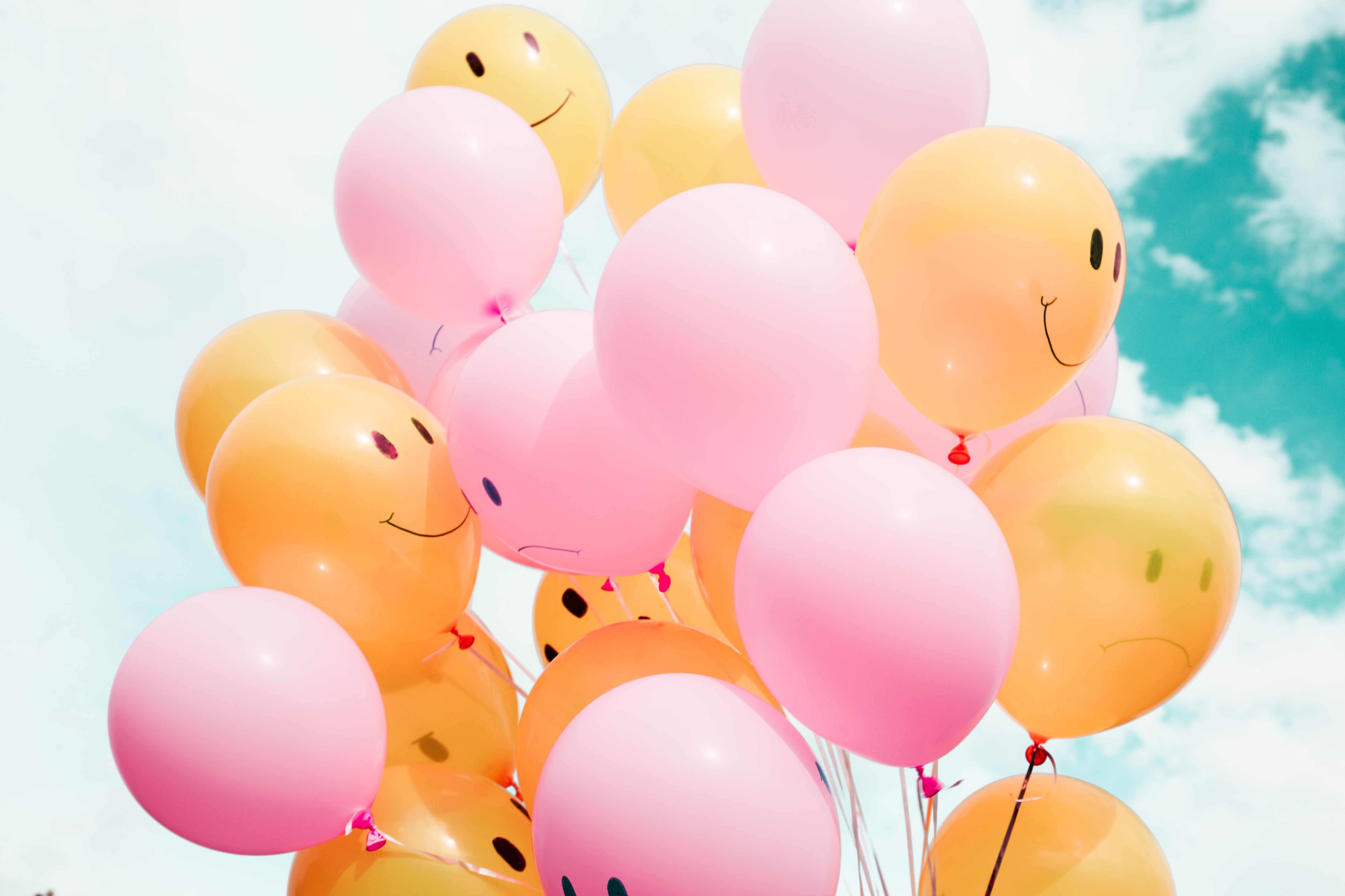 Smiling balloons with blue sky